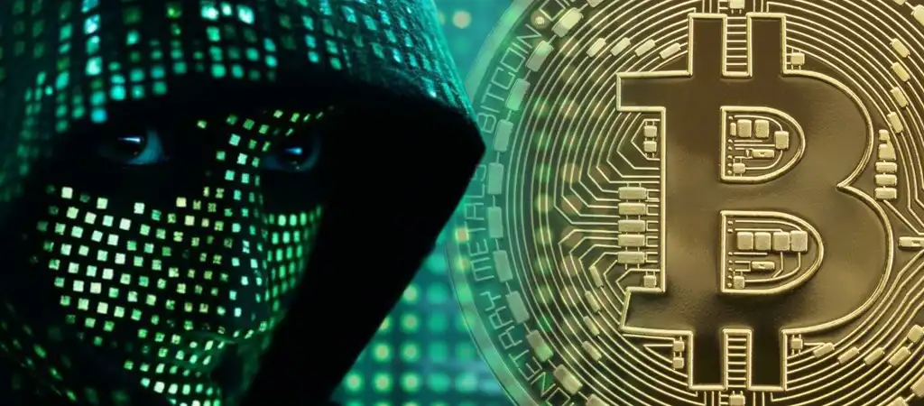 Kriptocsalási módszer illusztráció, egy kapucnis hacker digitális maszkban, Bitcoin szimbólummal, amely a kriptovaluta csalások és online fenyegetések veszélyét ábrázolja.